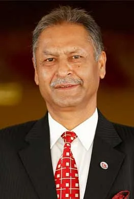 Dinesh Adhikari background portrait