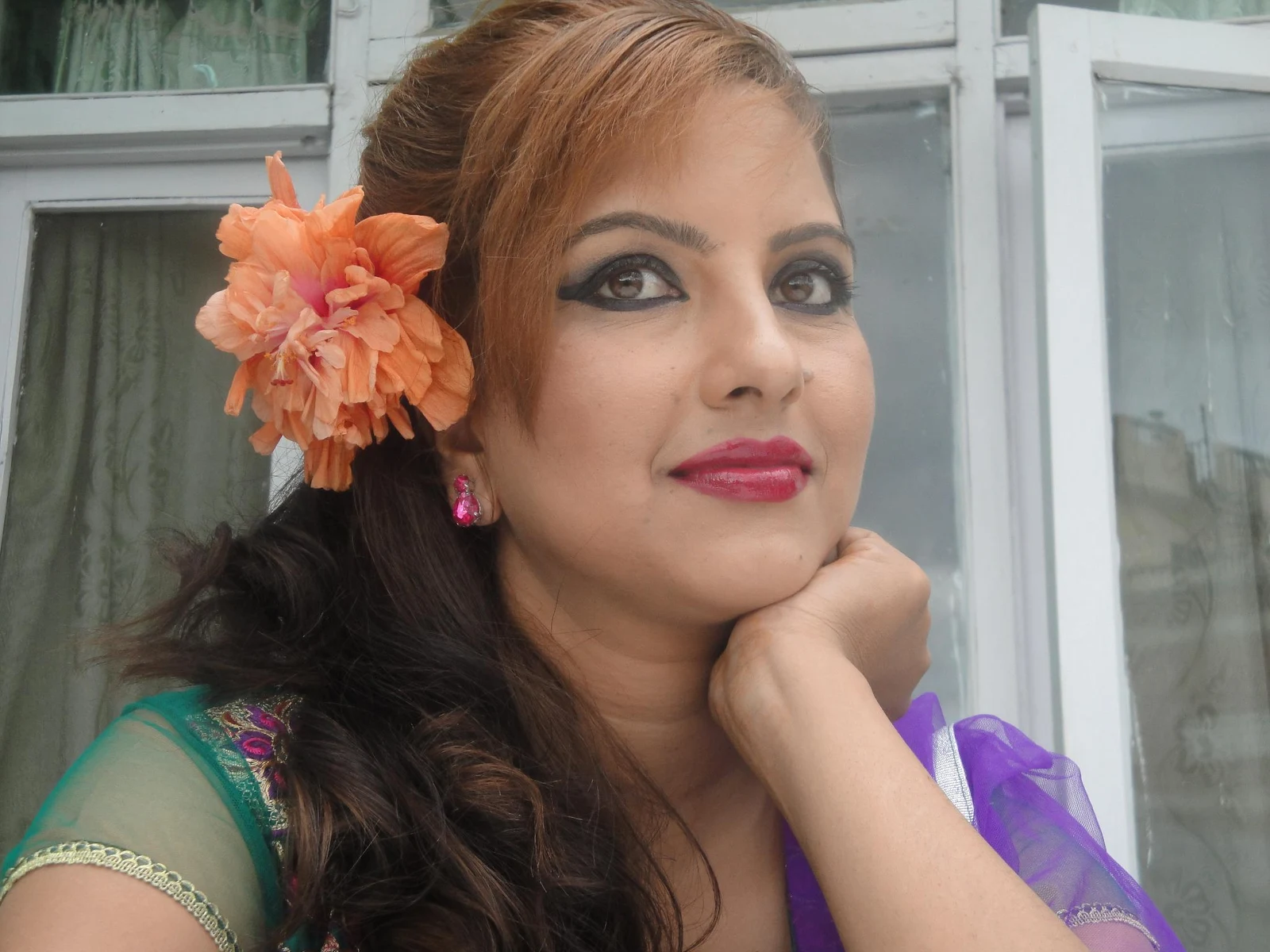 Gita Adhikari background portrait