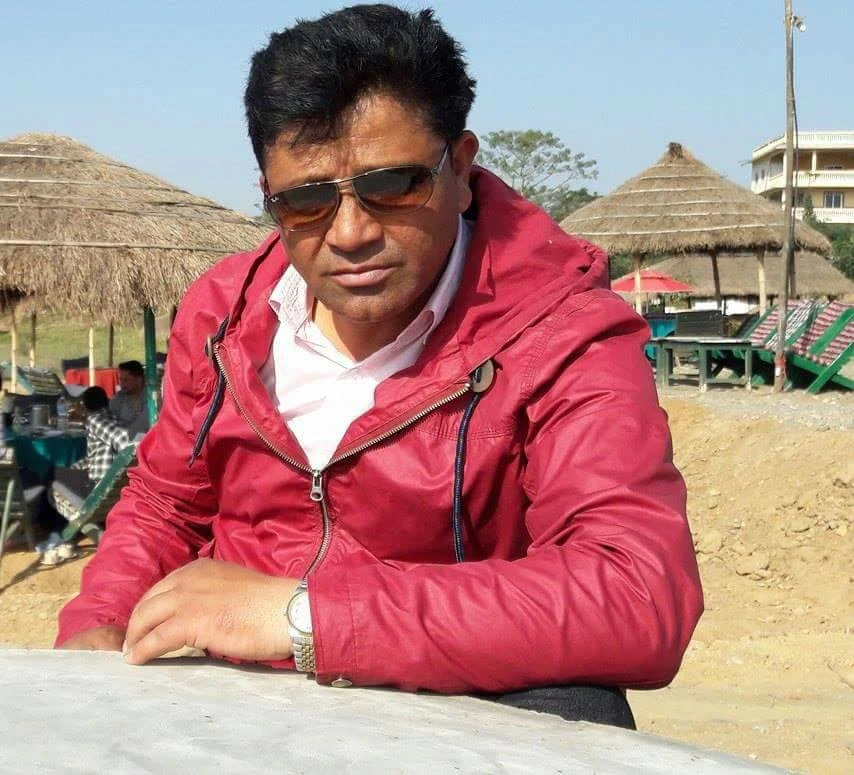Madan Ghimire background portrait