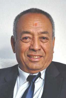 Manjukumar Shrestha background portrait