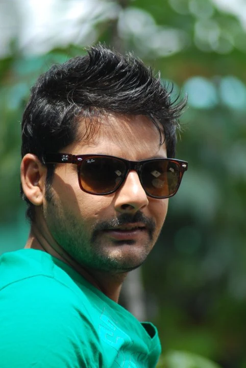 Mukesh Acharya background portrait