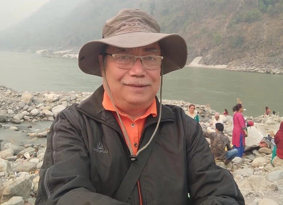 Mukunda Shrestha background portrait