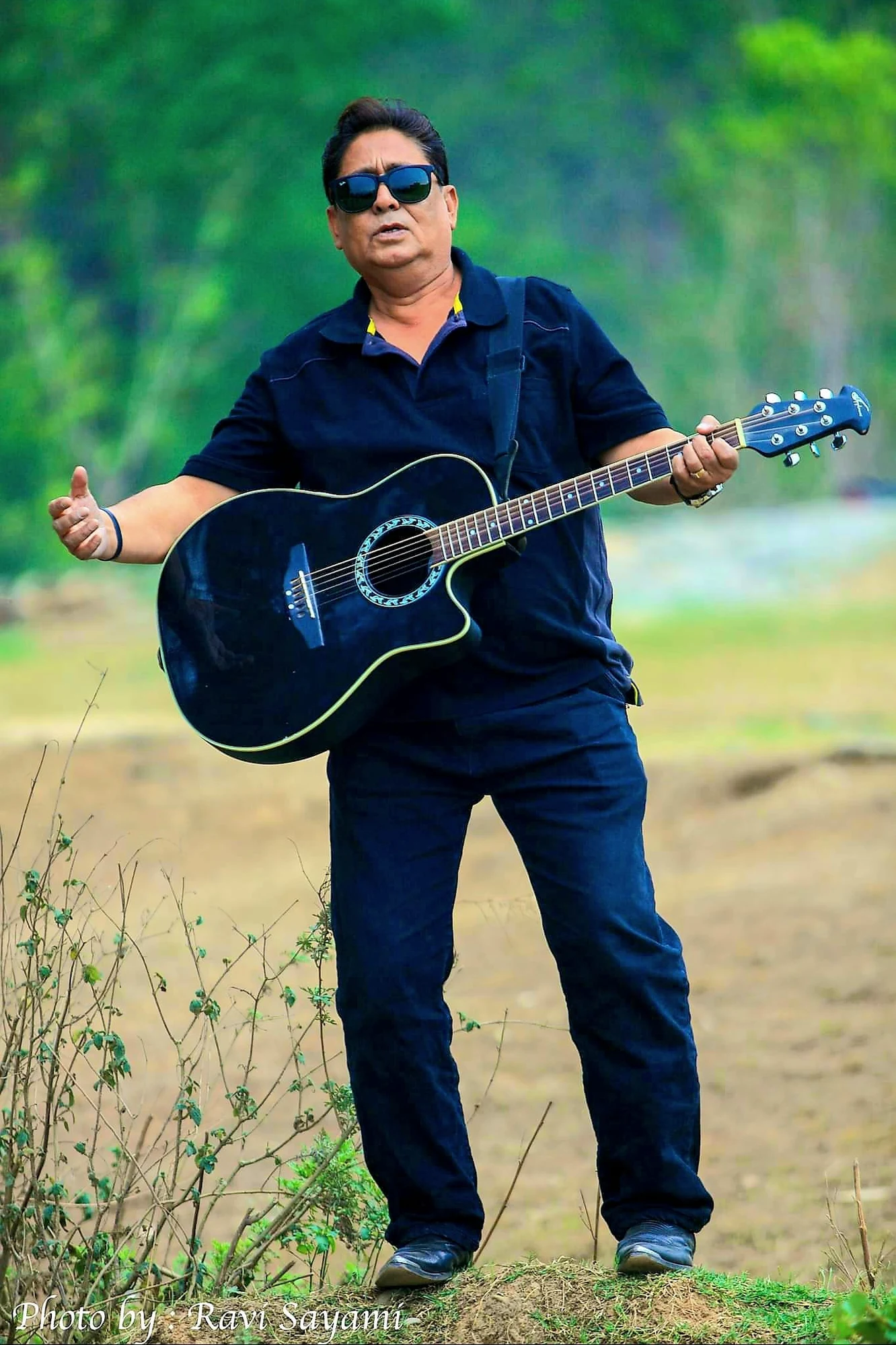 Om Bikram Bista background portrait