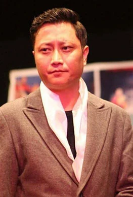 Prashant Tamang background portrait