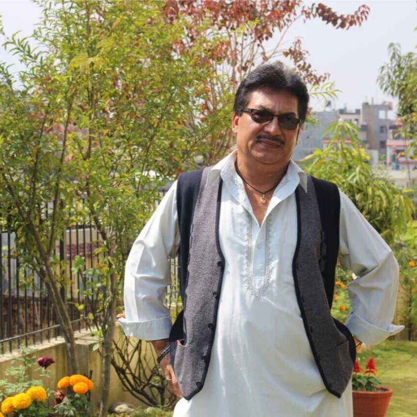 Puran Joshi background portrait