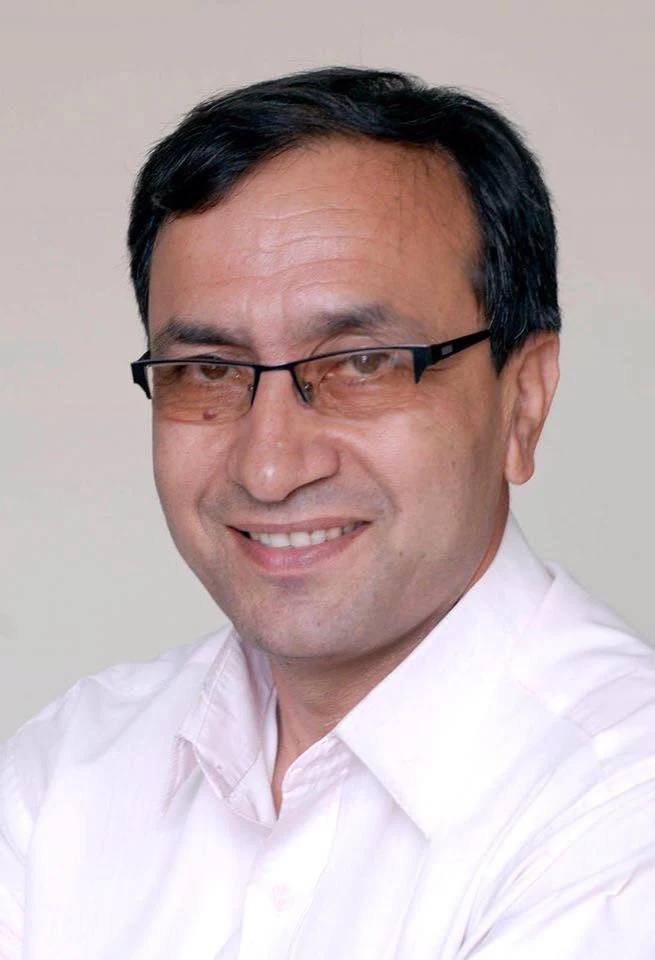Raman Ghimire background portrait