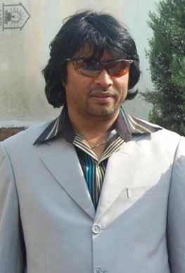Shankar Acharya background portrait