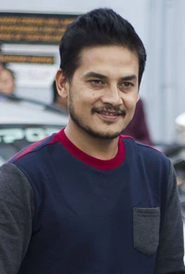 Sudarshan Thapa background portrait