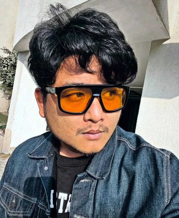 Suyog Gurung background portrait