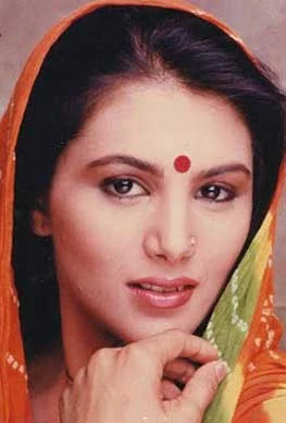 Tripti Nadakar background portrait
